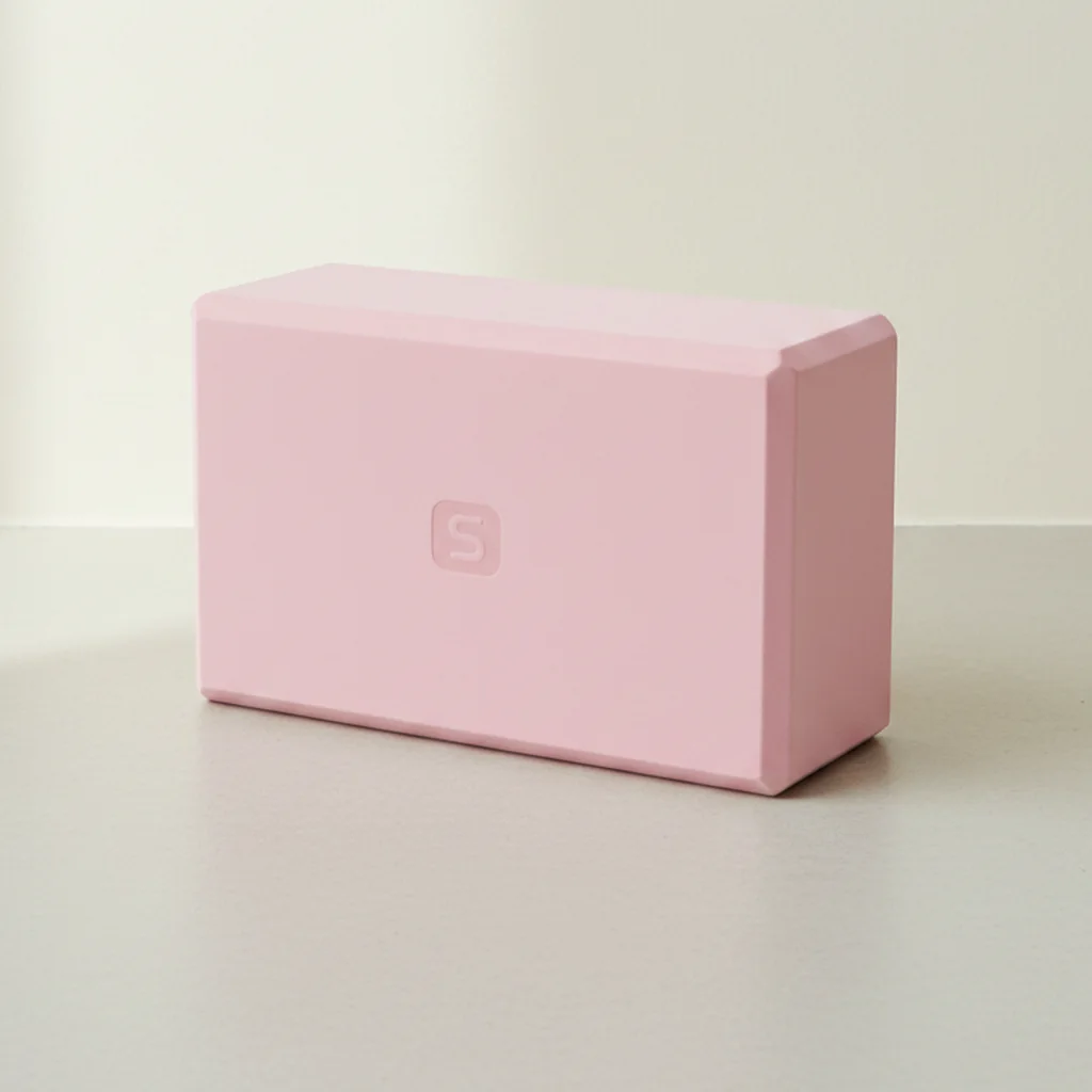 The pink block resting on its long edge, medium height